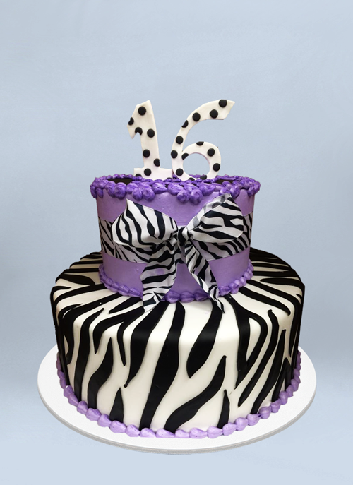 Photo: 2 tier zebra fondant cake with purple frosting