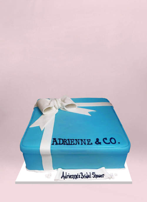 Photo: blue tiffany box shaped cake with white fondant ribbon