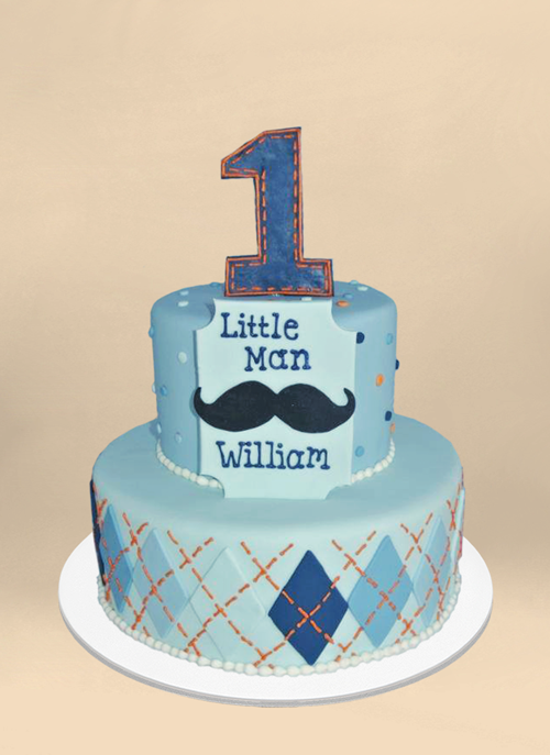 Photo: light blue fondant cake with orange and blue argyle patter, large #1 on top