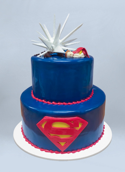 Photo: baby superman crashing to earth mirror glaze cake