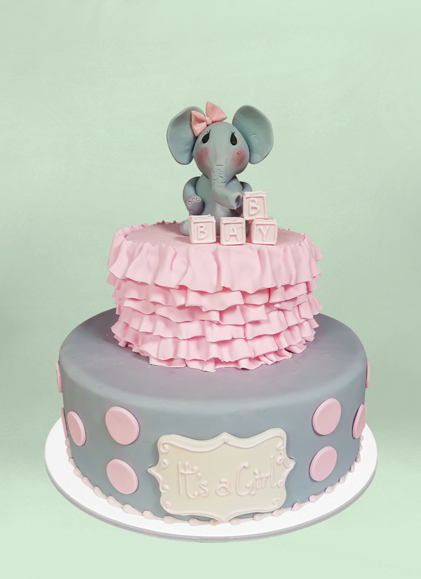 Photo: elephant in a shirt tiered fondant cake