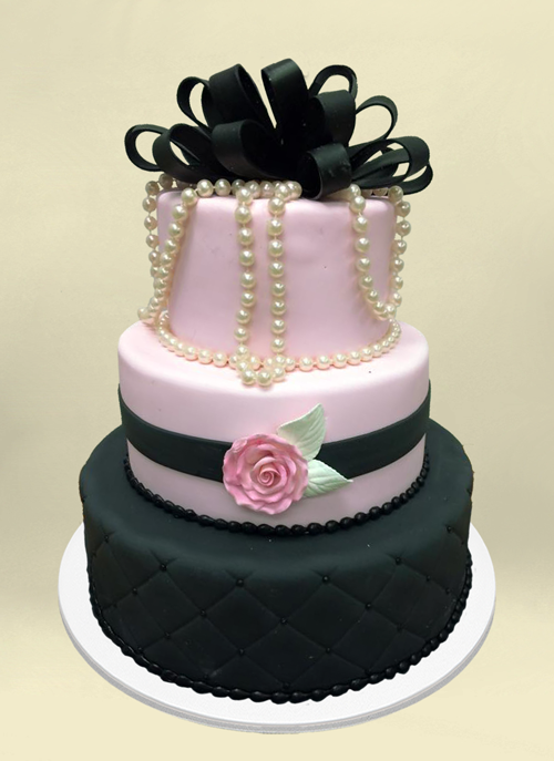 Photo:d black, pink fondant cake with frosted flower, real pears and black fondant ribbons