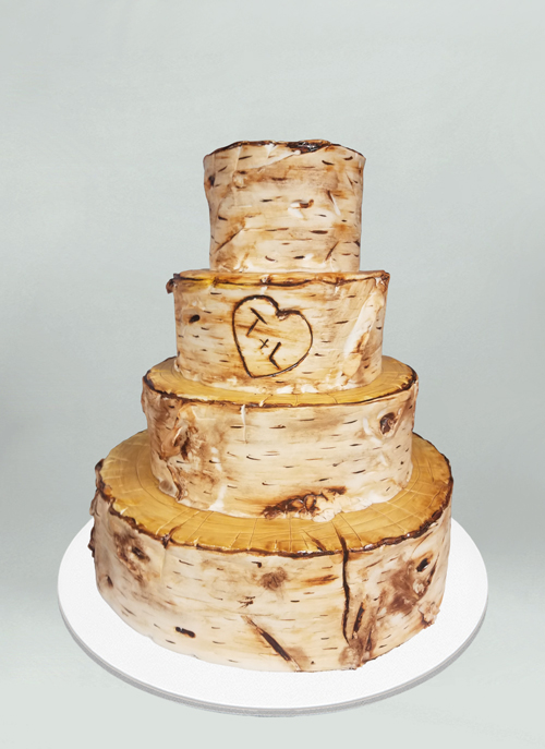 Photo: tree stump themed cake with initials carved into it