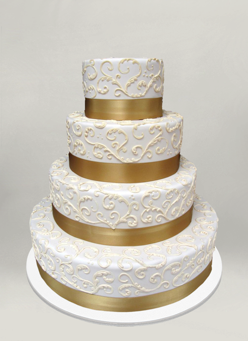 Photo: cake with gold ribbon with gold china scroll pattern